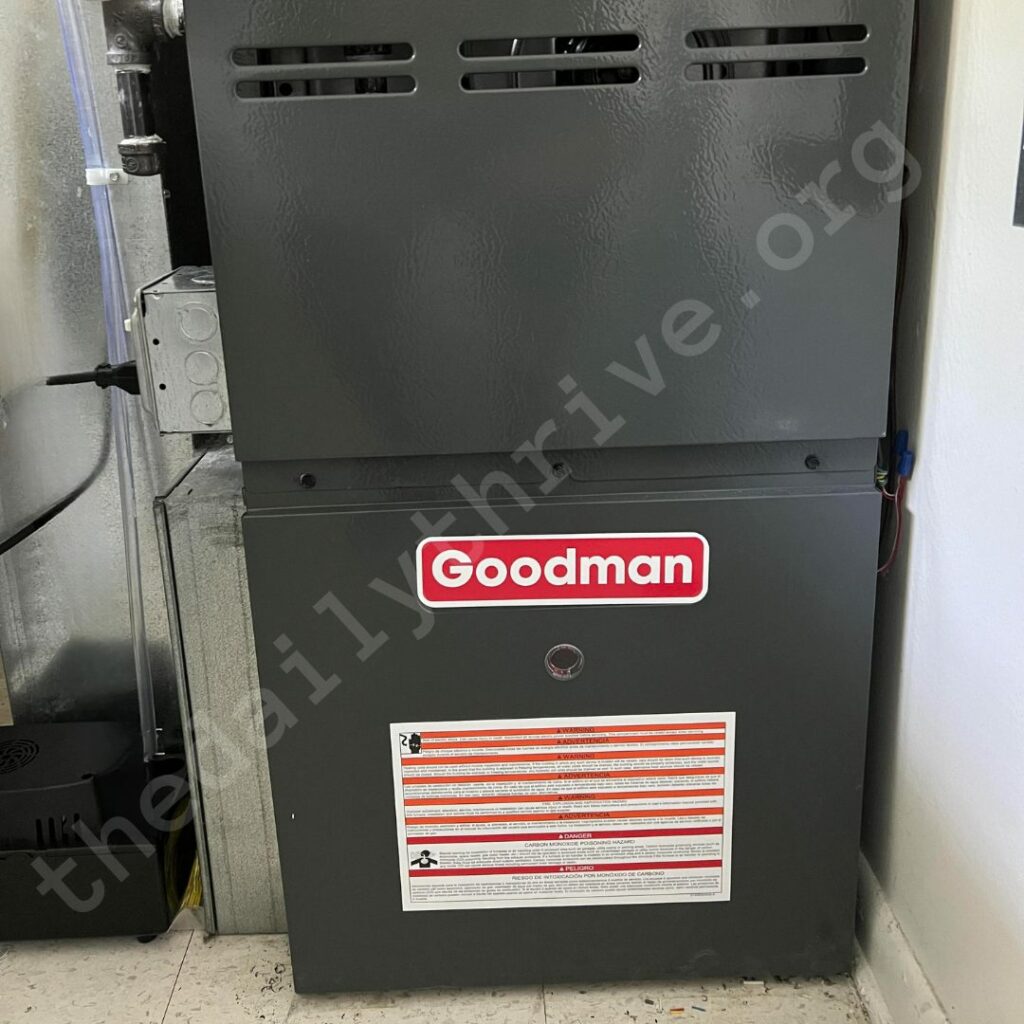 Close-up photo of a Goodman furnace access panel