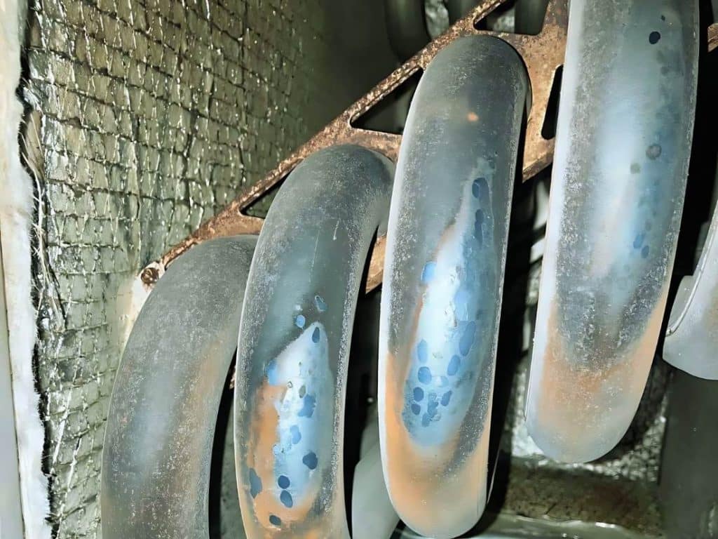 furnace with a cracked heat exchanger