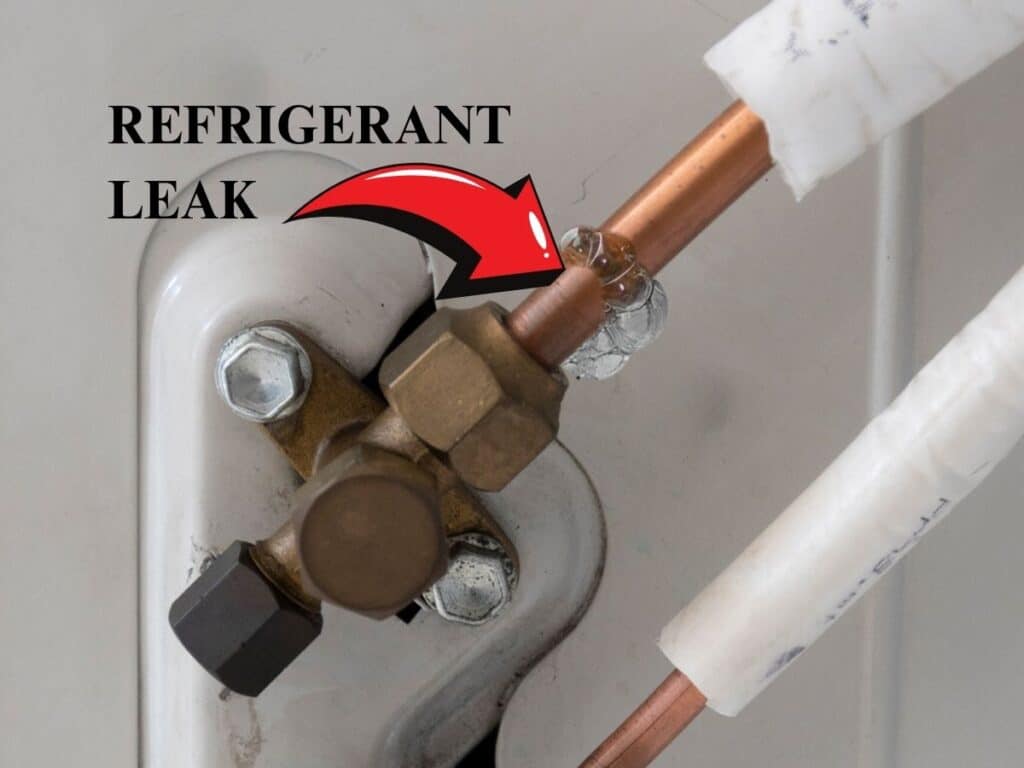 A refrigerant leak, which can be hazardous and should be addressed promptly